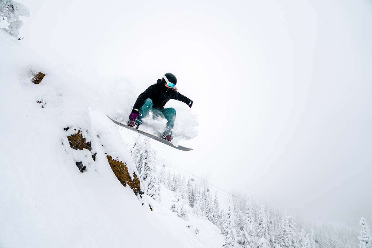 Catching air in resort (Oyuki snowboard pants and bib)